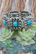 Turquoise Hereford Rose Silvertone Stretch Bracelet